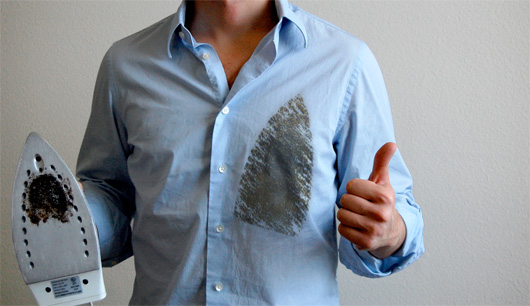 A man with an iron burn on his shirt