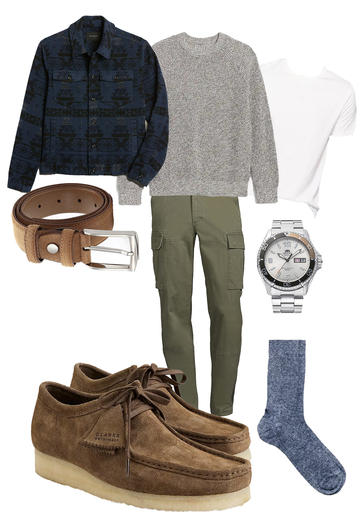 Men's fall outfit featuring a blue geometric-patterned jacket, light gray sweater, white t-shirt, olive-green cargo trousers, tan belt, brown suede shoes, silver watch, and dark blue socks