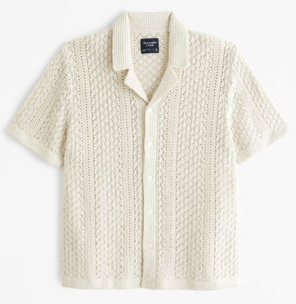 a textured crochet material short sleeve polo shirt