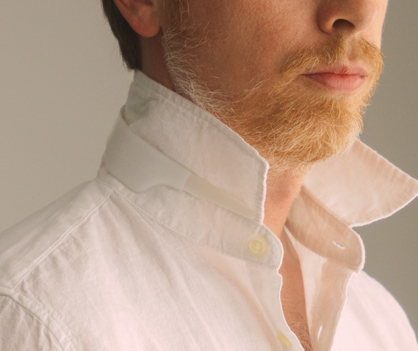 close up of aslick collar under shirt collar